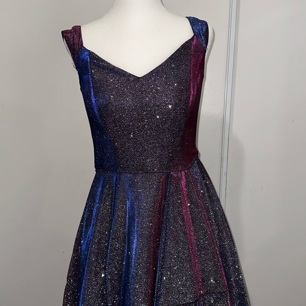 Blondie Nites off the shoulder gradient prom dress.